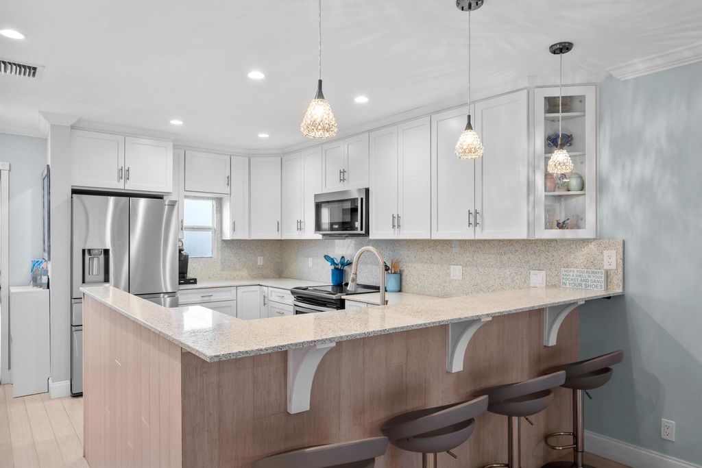 Photo of 3851 N Ocean Boulevard #204, Delray Beach, FL 33483 (MLS # R11094066)