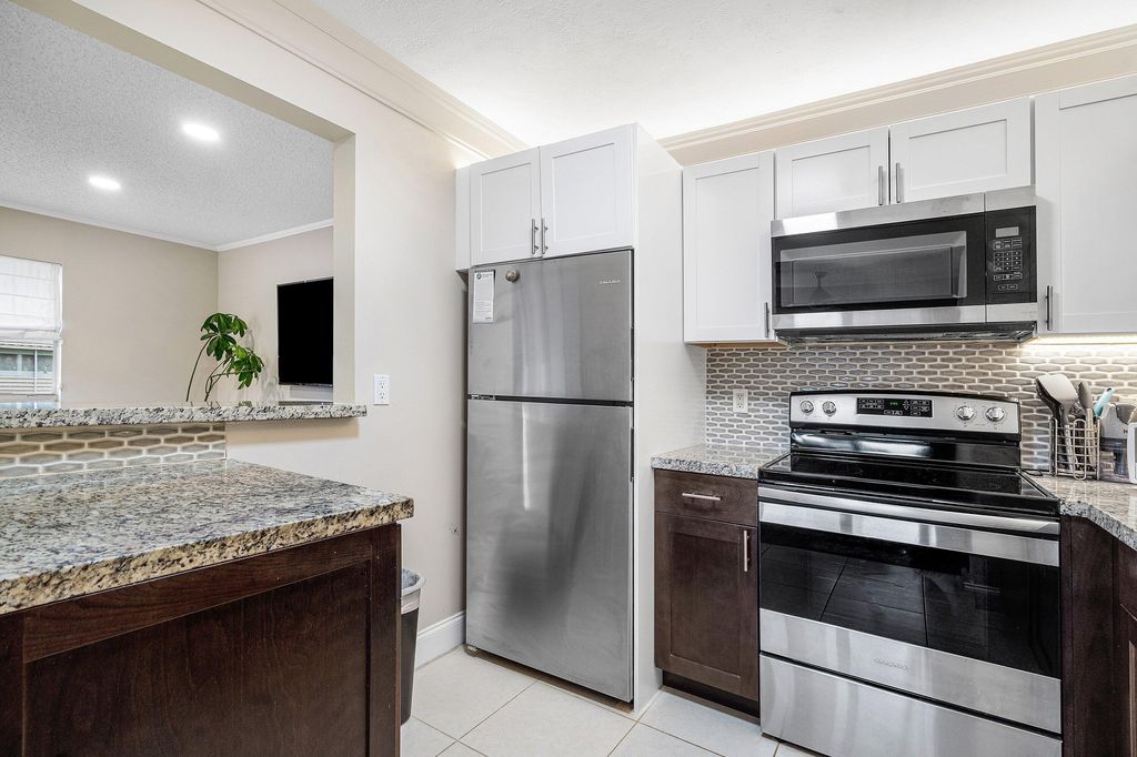 Photo of 142 Brittany Terrace, Delray Beach, FL 33446 (MLS # B26025861)