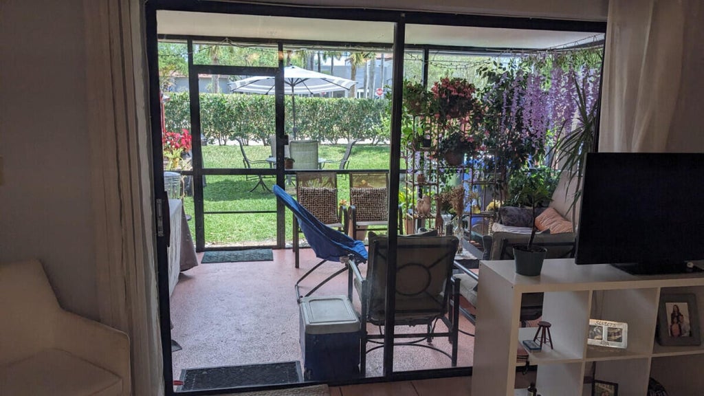 Photo of 353 NW 103rd Terrace, Pembroke Pines, FL 33026 (MLS # B26040646)