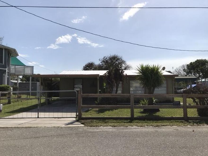 Welcome to easy living on a freshwater canal with access straight to Lake Okeechobee!! This well maintained 3 bedroom/ 2 bath mobile home offers everything you need for laid back waterfront lifestyle. New metal roof 2018, new A/C 2020, Florida room, private boat ramp, seawall, boat dock and a shed for storage. Call for your appointment today. All measurements are approximate.