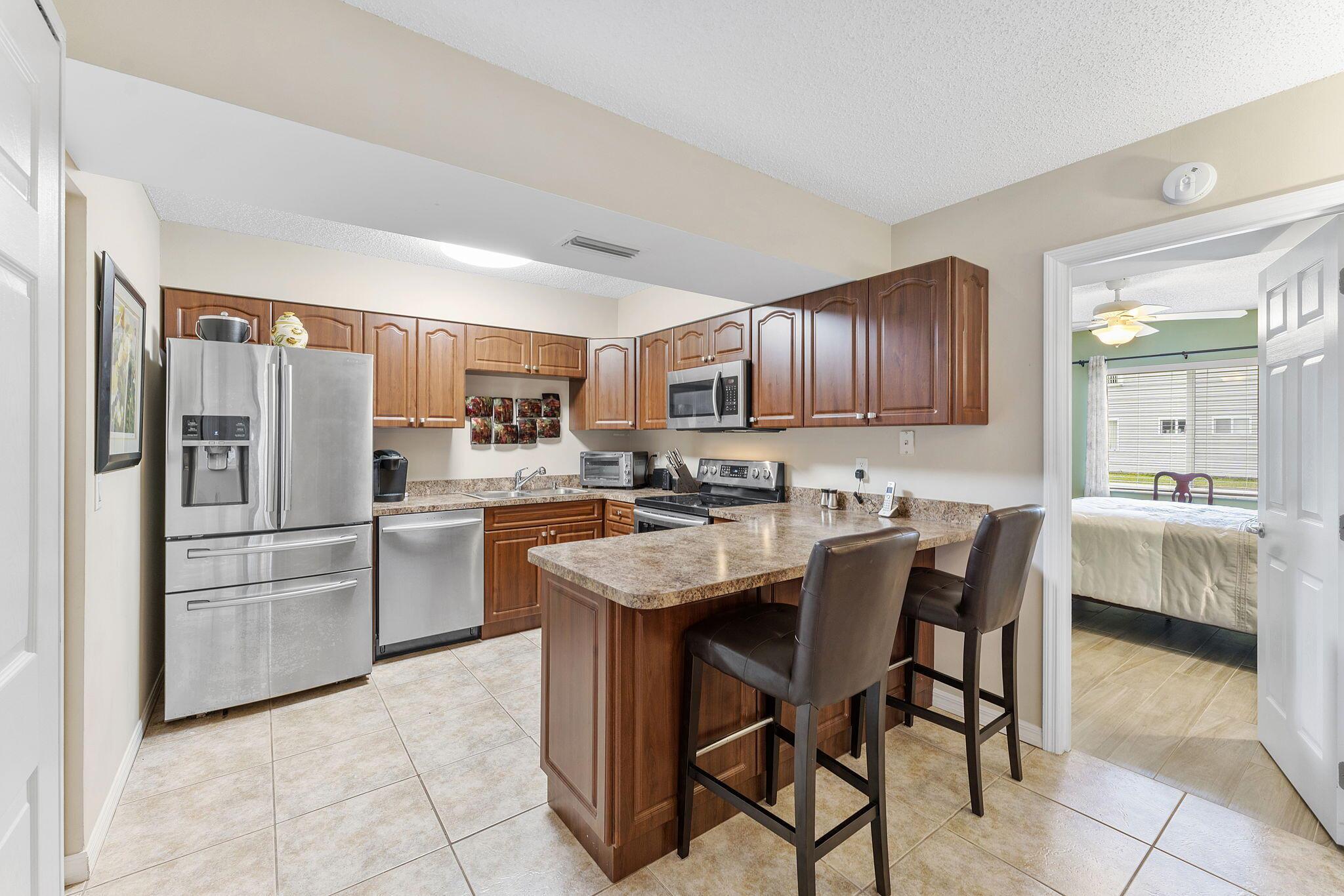 Welcome home! This ground floor corner unit is your next slice of paradise in one of Port Saint Lucie's most desirable areas. This beautifully updated 3 bedroom 2 bathroom condo, comes with a brand new AC, 2017 water heater, updated appliances, tons of natural light along with tile floors throughout the home.