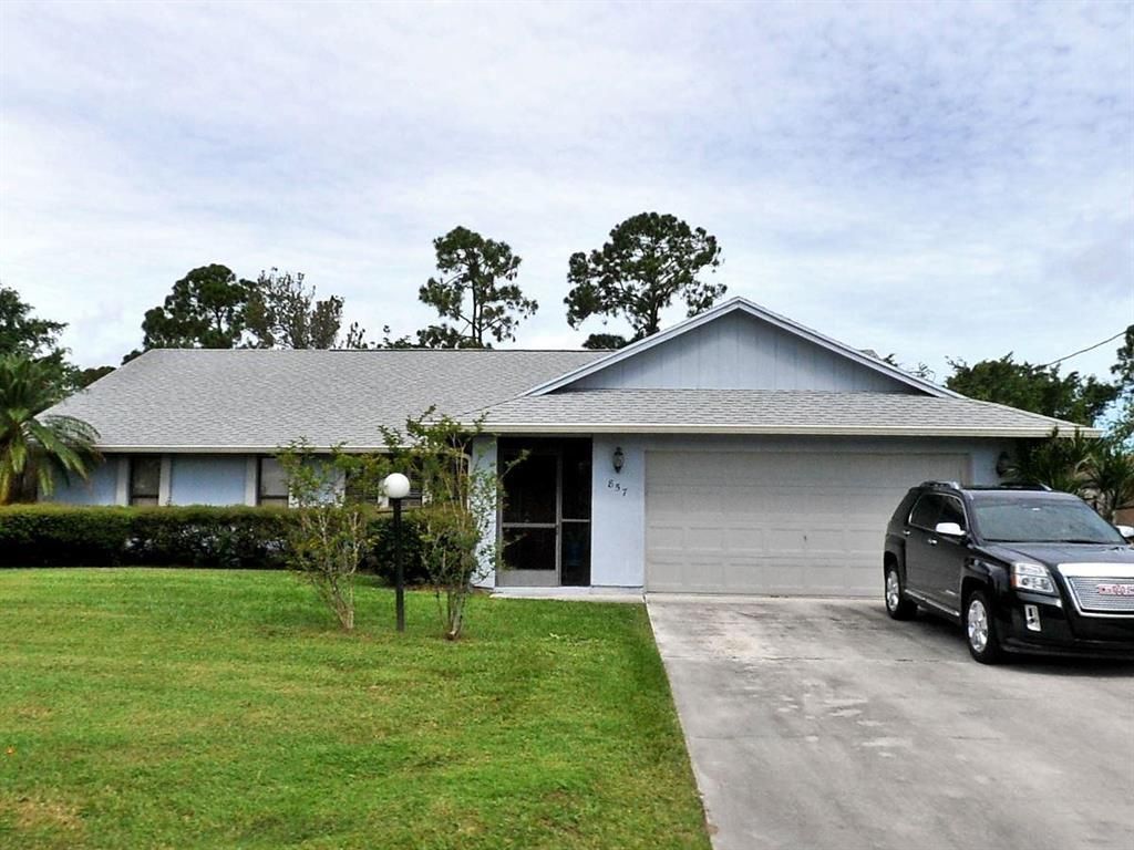 Photo of 857 SE Lansdowne Avenue, Port Saint Lucie, FL 34983 (MLS # R10714267)