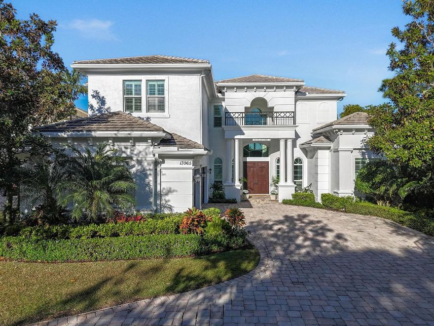 Commanding an extraordinary position along a private canal with sweeping, direct Intracoastal views, this stunning waterfront estate embodies the pinnacle of Palm Beach luxury and maritime living. With a 70-foot private dock, Hi Tide Topless 12,000 lb boat lift, and capacity for a 65-foot yacht or multiple vessels, the residence offers effortless deep-water access with no fixed bridges, just moments from the Atlantic. Perfectly situated on a premium cul-de-sac homesite within the exclusive, guard-gated enclave of Frenchman's Harbor, the property delivers both exceptional privacy and breathtaking panoramic vistas—an unmatched sanctuary for the discerning boating enthusiast. The estate's prime canal-front vantage point provides unobstructed sight lines down the waterway and an uncommon feeling of openness rarely found in South Florida. Spanning over 5,000 square feet, this rarely available Delena model welcomes you with a grand double-door entry into a dramatic 24-foot foyer, where walls of glass frame tranquil water views. A sculptural staircase and sunlit interiors establish an atmosphere of elevated coastal sophistication throughout.

Designed for intimate living and grand-scale entertaining alike, the chef's kitchen is appointed with Wolf and Sub-Zero appliances, custom cabinetry, and an expansive waterfall island. The space opens seamlessly into the living and dining areas, where sliding glass walls dissolve the divide between indoors and out. Beyond lies a resort-style lanai featuring a Twin Eagles summer kitchen, covered entertaining pavilion, and a sparkling pool with sun shelf and spa, all overlooking the manicured grounds and shimmering Intracoastal backdrop.

The main-level primary suite is a serene retreat offering dual walk-in closets, a spa-inspired bath with soaking tub and oversized shower, and an adjoining private den ideal as an office, nursery, or fitness space. The first floor also includes a guest suite with private bath, formal living and dining rooms, a powder room, and a dedicated officeeach space curated with refined balance and timeless elegance.

Upstairs, a spacious loft connects five additional bedrooms, including a versatile bonus suite with its own ensuite bath, perfect as a media room, guest quarters, or lounge. French doors reveal an expansive terrace capturing spectacular sunset views over the Intracoastal, creating an exquisite setting for al fresco dining or evening cocktails.

Additional luxuries include a three-car garage with epoxy flooring, extended driveway, impact-rated windows and doors, and a dedicated pool bath.

Set within Frenchman's Harbor, one of Palm Beach County's most prestigious waterfront enclaves, owners enjoy 24-hour manned security, exceptional deep-water dockage, and proximity to world-class beaches, golf, fine dining, and luxury shopping.

With its unrivaled vantage point, rare dockage capabilities, and architectural sophistication, 13965 Willow Cay Drivestands as a true statement of distinction, a legacy estate of exceptional caliber on South Florida's Gold Coast.