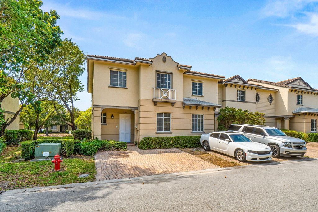 Photo of 1221 Abaco Lane, Riviera Beach, FL 33404 (MLS # B26007962)