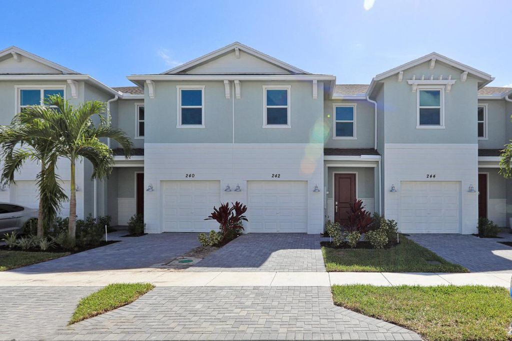 Photo of 242 SE Woodbark Street, Port Saint Lucie, FL 34984 (MLS # R11095985)