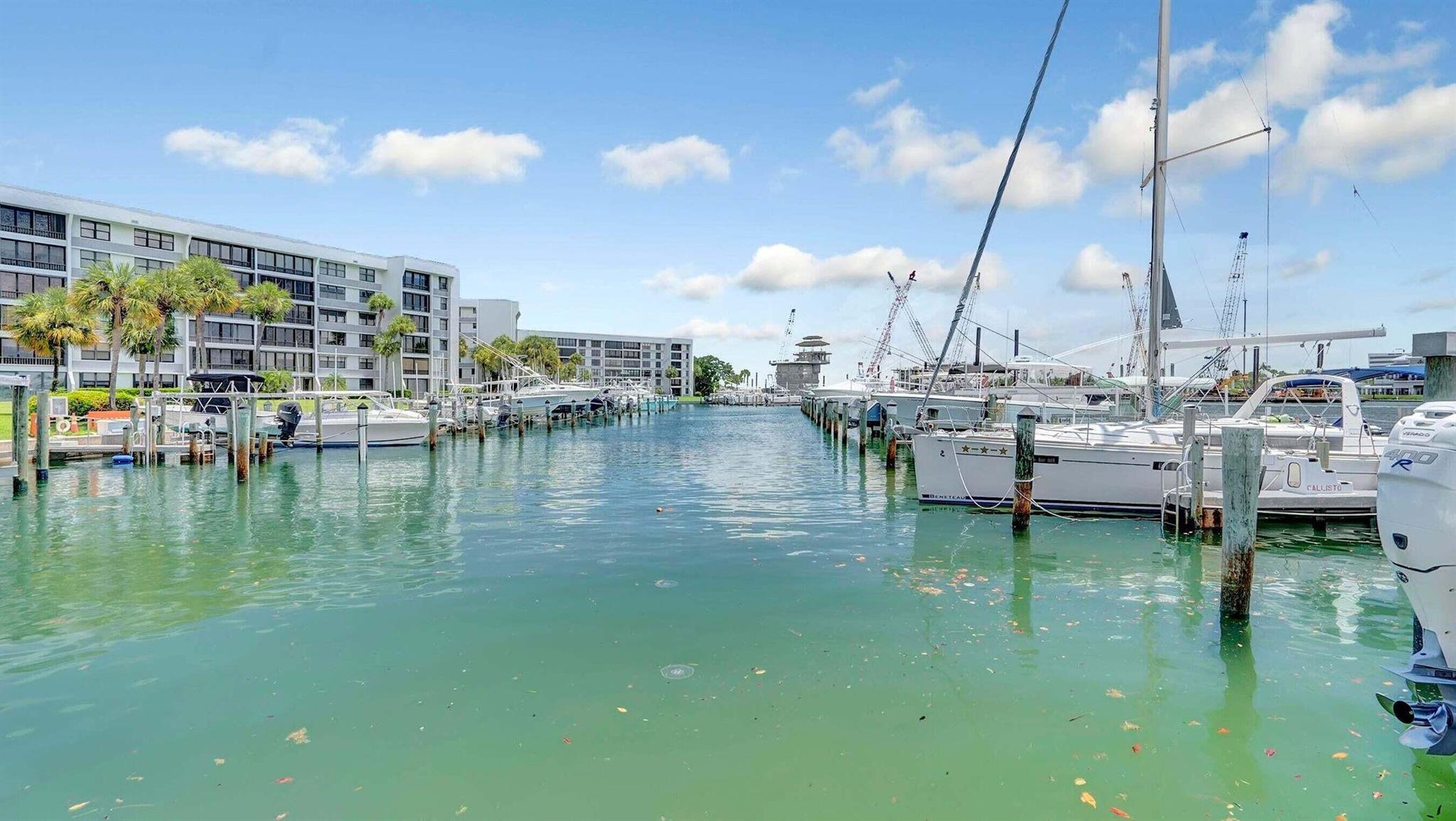 This stunning condo in the heart of Jupiter is available for rent at $3,995 per month during the off-season and $5,995 per month for the 2026 season. It presents a remarkable opportunity to experience the best of Jupiter, with breathtaking water views that can be enjoyed all day long. The fully furnished, turn-key 2-bedroom, 2-bathroom unit features an extended floor plan that includes an additional full den/office, providing a spacious layout reminiscent of a home.The ground floor unit boasts beautiful wooden flooring throughout and is bathed in natural light, with direct views to the East and Southeast. Jupiter cove is an amazing property with over 17 acres of land, the activities are endless. Enjoy the Jupiter lifestyle with top notch dining, and close proximity to PBI Airport!