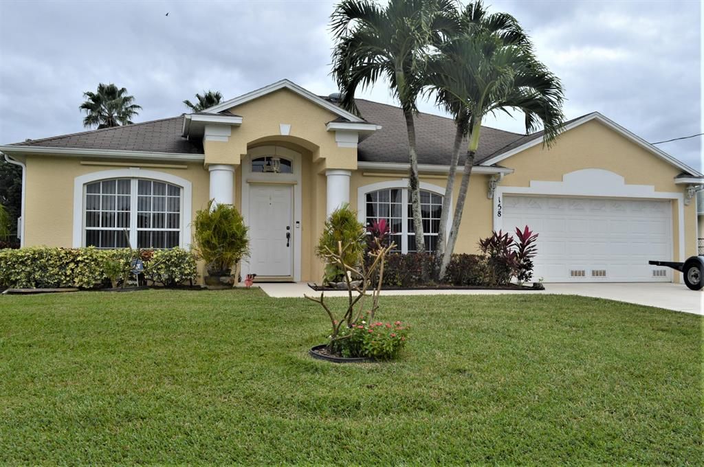 Photo of 158 NE Twylite Terrace, Port Saint Lucie, FL 34953 (MLS # R10752850)