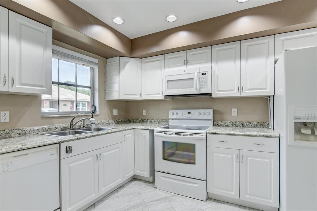 Photo of 1430 SW 25th Way #C, Boynton Beach, FL 33426 (MLS # R10723593)