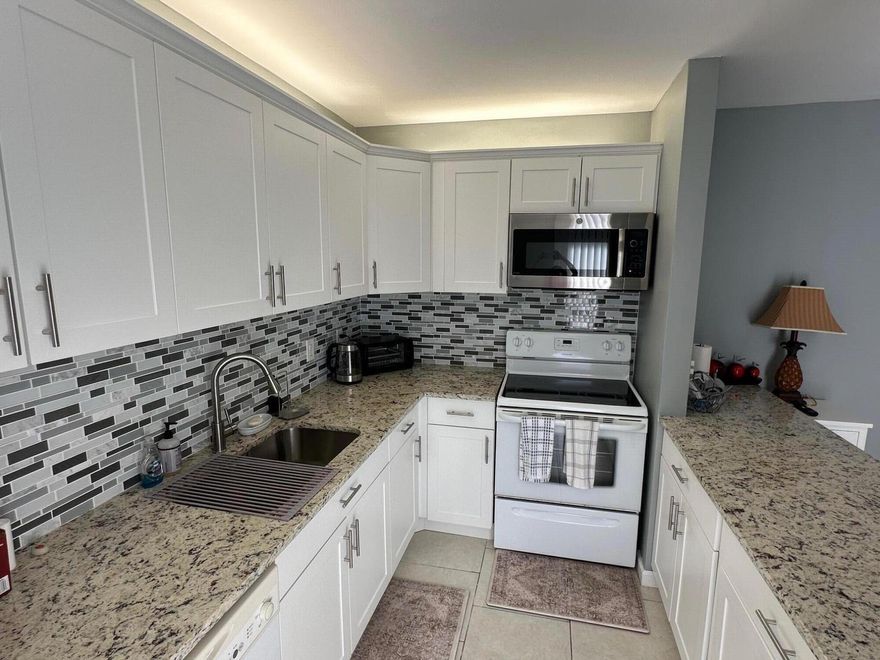 Beautiful 2-bedroom, 2.5-bath townhouse located in the heart of Palm Beach Gardens. Conveniently close to top-rated schools, shopping, dining, airports, and with quick access to Interstate 95.  Recent upgrades include a new roof (2025, fully paid), new fences, new water heater (2025), remodeled kitchen with new countertops and cabinets, new flooring on the second floor, and two renovated bathrooms with quartz countertops. Move-in ready and ideally located for comfortable living.