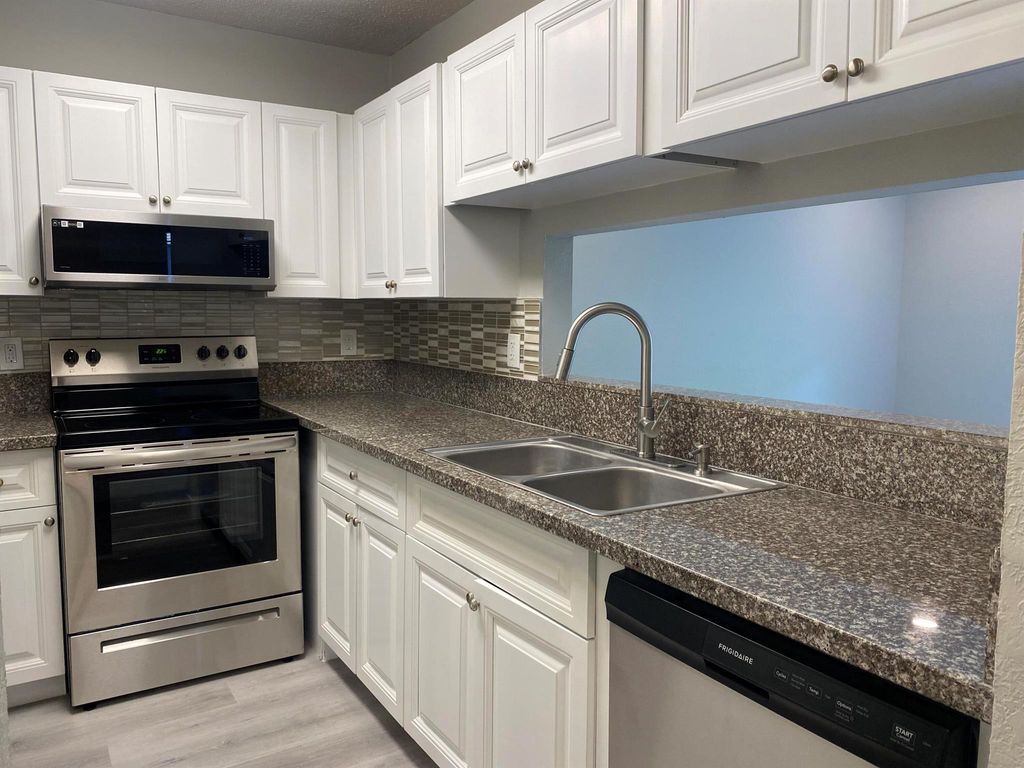 Photo of 11434 NW 43rd Street #1-4, Coral Springs, FL 33065 (MLS # R11053020)