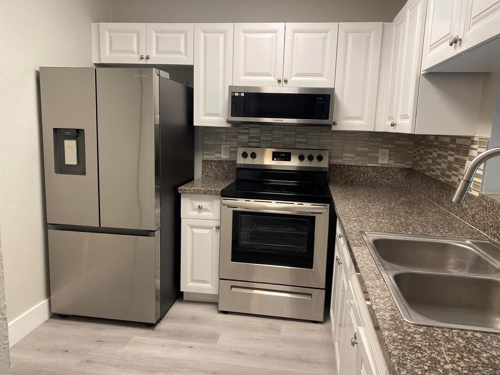 Photo of 11434 NW 43rd Street #1-4, Coral Springs, FL 33065 (MLS # R11053020)