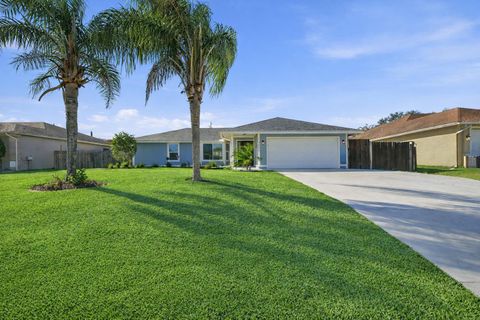Photo of 1482 SW Dow Lane, Port Saint Lucie, FL 34953 (MLS # R11162468)