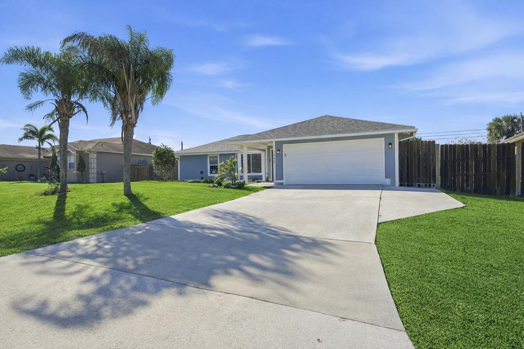 Photo of 1482 SW Dow Lane, Port Saint Lucie, FL 34953 (MLS # R11162468)