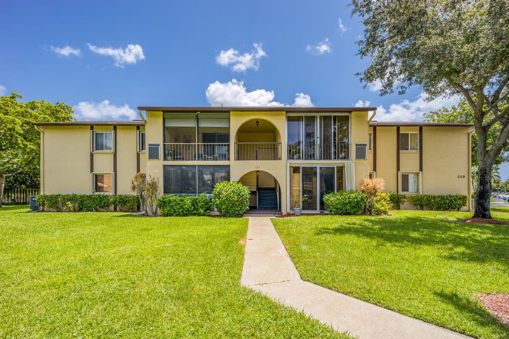 Photo of 329 Pine Ridge Circle #D1, Greenacres, FL 33463 (MLS # R10883878)