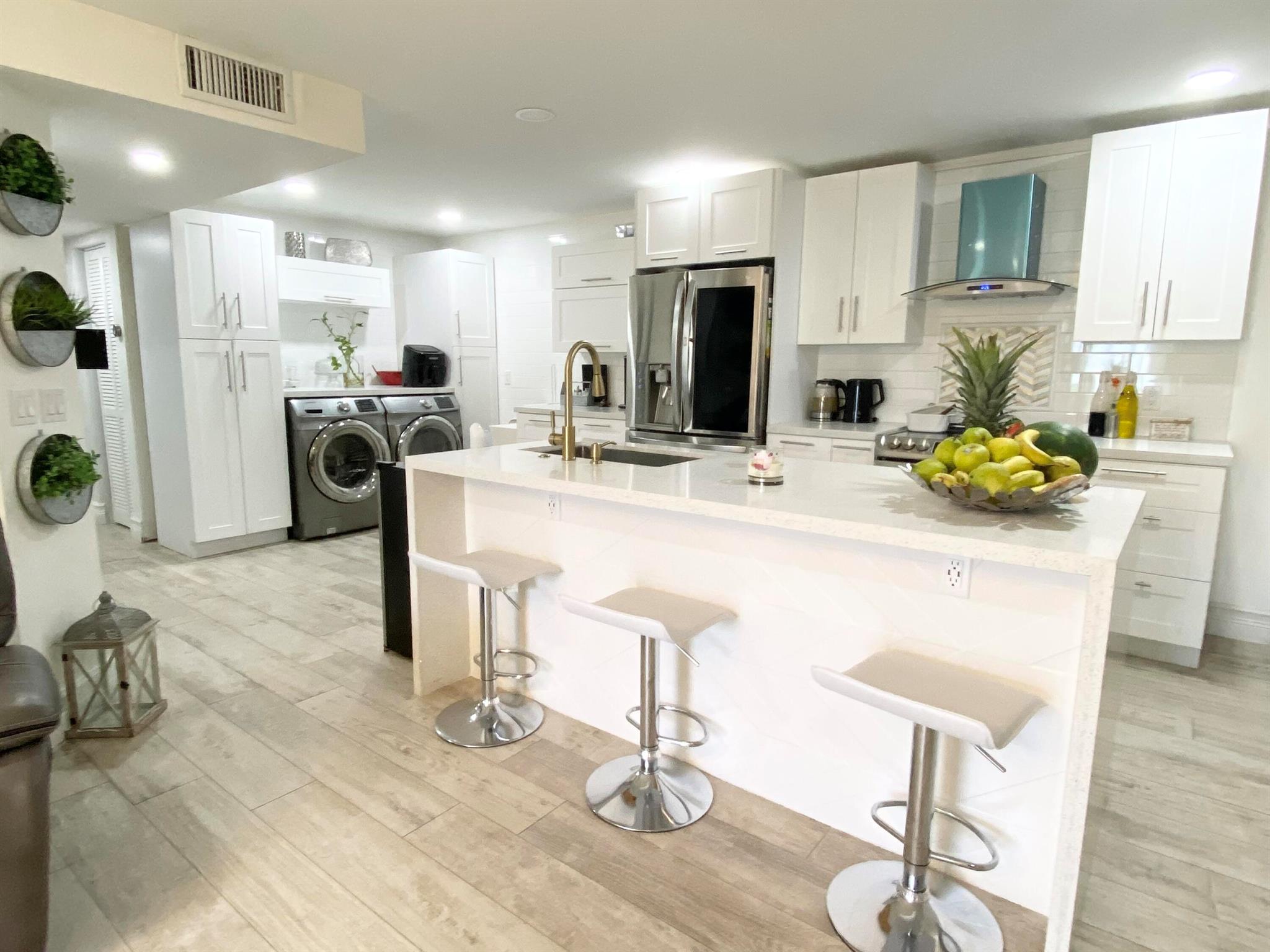 Beautiful, Spacious and Remodeled,3 bedrooms 2 Bathrooms plus office apartment located in Palm Club West. All ages community, New roof 2024, THE HOA INCLUDES WATER,CABLE, INTERNET, BUILDING INSURANCE AND MAINTENANCE IN THE MONTLY DUES, YOU ONLY PAY FOR ELECTRIC.First floor unit with large kitchen area featuring white shaker cabinets and quartz countertops. Wood looking porcelain floor throughout, ceiling fans and recessed led lights, full size washer and dryer. Modern walking showers, Relaxing views from the screened patio.Gated community offers clubhouse, pool, tennis courts, walking paths and more.Convenient location close to shoppings, restaurants, schools, medical facilities and beautiful beaches.SELLER WILL COVER $8,000 from buyer closing cost.
