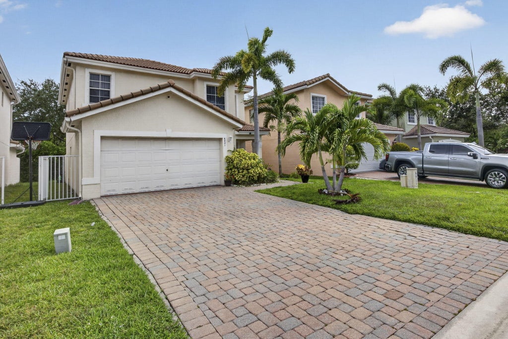 Photo of 6021 Adriatic Way, West Palm Beach, FL 33413 (MLS # B26056264)