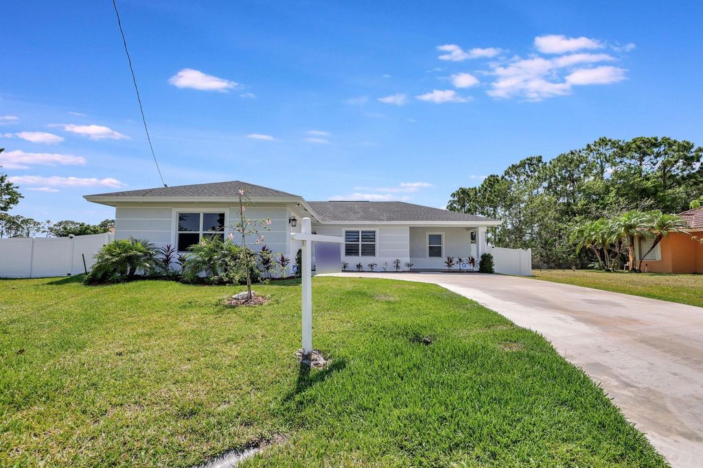 Photo of 6132 NE Drophy Court, Port St Lucie, FL 34986 (MLS # F10439111)