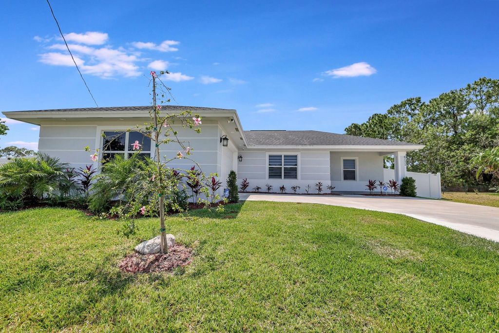 Photo of 6132 NE Drophy Court, Port St Lucie, FL 34986 (MLS # F10439111)