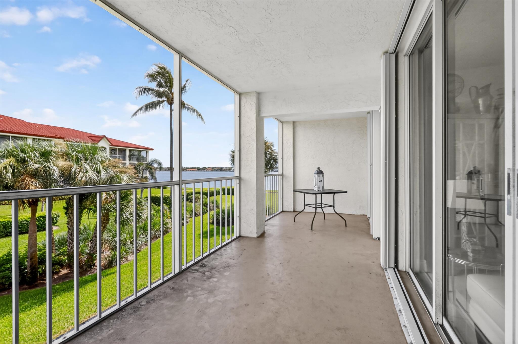 All Florida's finest living in this gorgeous 2 bedroom/2 bath, second floor condo with a spectacular intracoastal view from it's own screened balcony. Updated, light, bright spacious unit in Half Moon Bay offers a wide variety of amenities - 2 resort style pools, walking trail, tennis, sauna, hot tub and bocce. Live in your paradise with a large open living space and your own convenient in-unit washer and dryer.  This all age gated community, allows small dogs and is FHA approved. Perfect winter get away or full time residence.