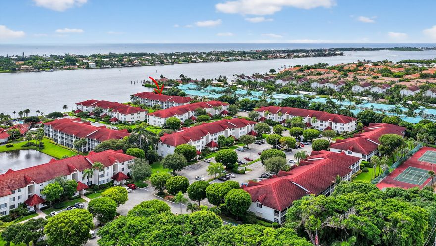 BACK ON MARKET! Spectacular intracoastal view, all Florida's finest living in this gorgeous 2 bedroom/2 bath, second floor condo. Updated, light, bright spacious unit in Half Moon Bay offers. Live in your paradise with a large open living space and your own convenient in-unit washer and dryer. A wide variety of amenities - 2 resort style pools, walking trail, tennis, sauna, hot tub and bocce, tennis & pickleball. This all age gated community, allows small dog and can be rented immediately also FHA approved. Perfect winter get away or full time residence.