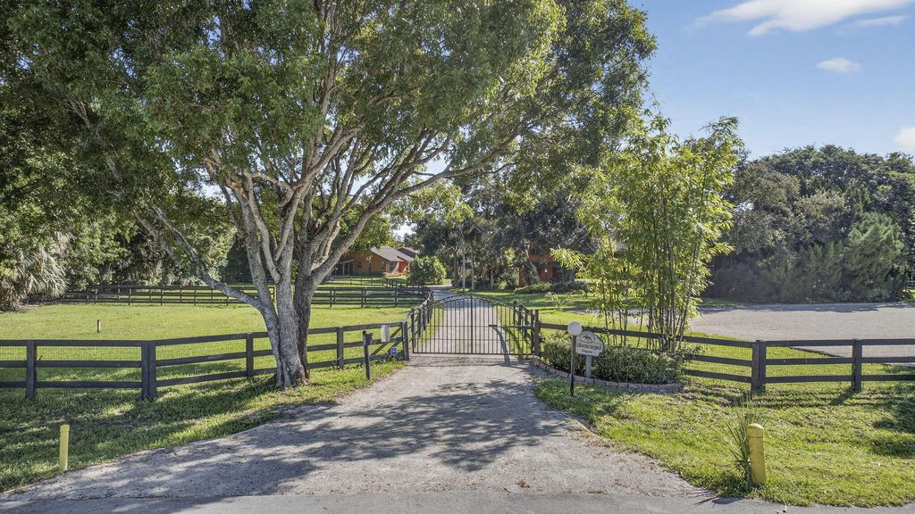 Photo of 852 Cindy Drive, Wellington, FL 33414 (MLS # R11164030)