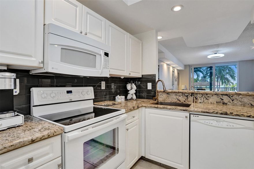 Beautiful 2BR/2BA corner residence in East Pompano Beach, directly across from the beach with tranquil canal views. This coastal retreat features an bright open-concept design, with granite countertops, creating a seamless flow for elegant living and entertaining. Split-bedroom layout with hurricane impact windows and private screened balcony. Rent immediately up to 4x per year at min. of 3 months, ideal for investors. Laundry facilities on each floor, private storage bin, 50-year inspection passed, building freshly painted, along with other major renovations completed, including a resort-style Olympic-sized pool. Small pets welcome. Enjoy private beach access across the street, providing a relaxing oceanfront retreat. Luxury multi-million condos rising next door enhance future value.