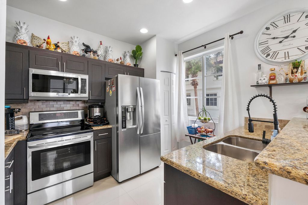 Photo of 12430 SW 50th Street #Unit 147, Miramar, FL 33027 (MLS # B26028234)