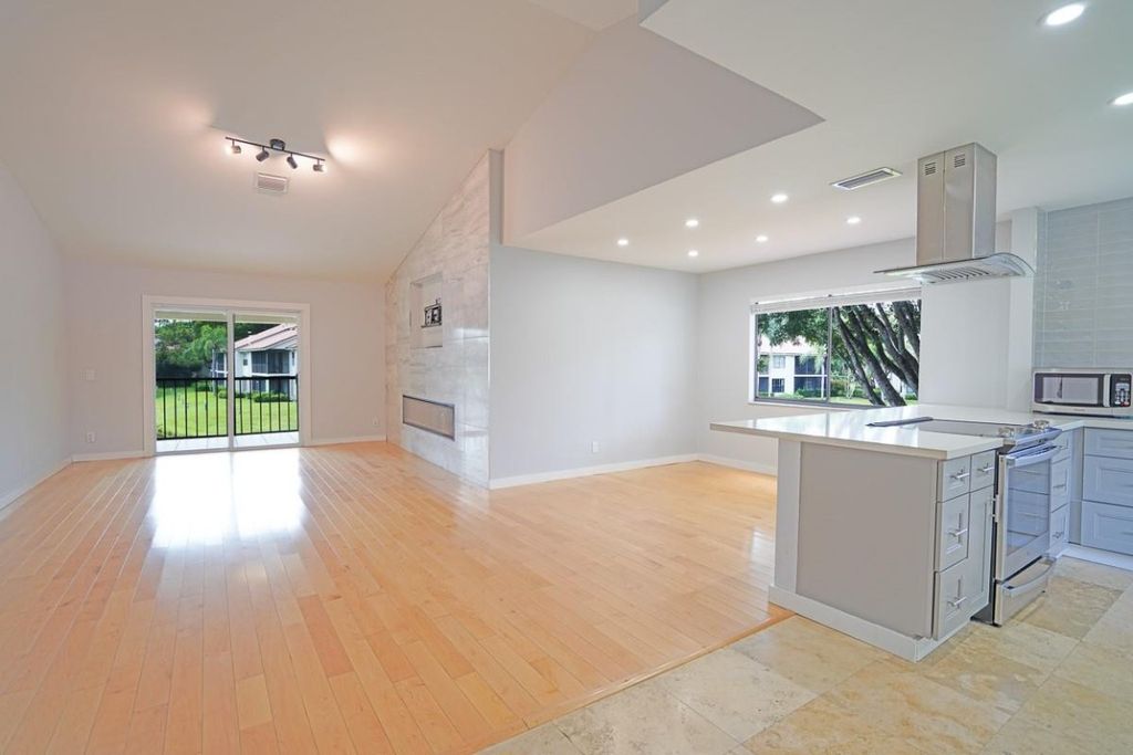 Photo of 5591 Coach House Circle #H, Boca Raton, FL 33486 (MLS # F10496221)