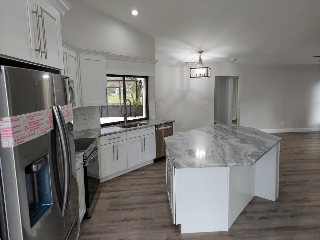 Photo of 2111 SE Bowie Street, Port Saint Lucie, FL 34952 (MLS # R10956656)