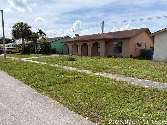 Photo of 11044 NW 23RD Court, Sunrise, FL 33322 (MLS # B26053699)