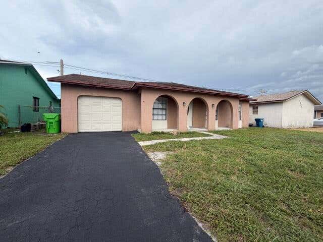 Photo of 11044 NW 23RD Court, Sunrise, FL 33322 (MLS # B26053699)