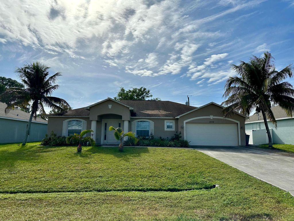 Photo of 1552 SW Apricot Road, Port Saint Lucie, FL 34953 (MLS # R11026805)