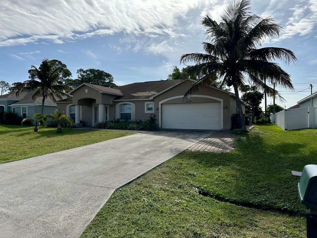 Photo of 1552 SW Apricot Road, Port Saint Lucie, FL 34953 (MLS # R11026805)