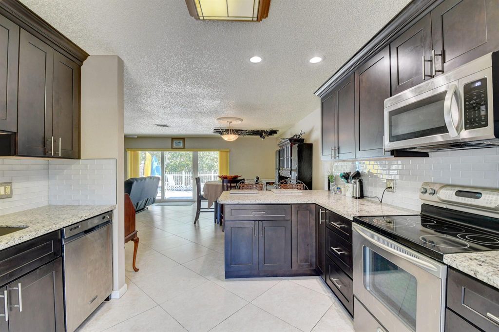 Photo of 646 Mariners Way, Boynton Beach, FL 33435 (MLS # R10888967)
