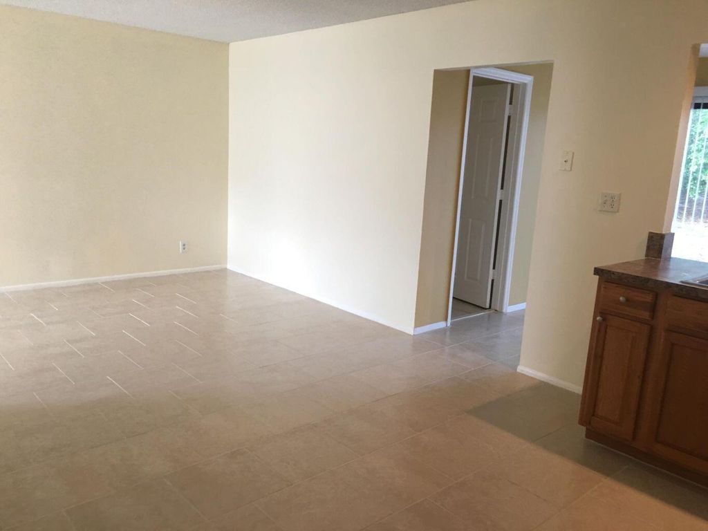 Photo of 1917 SE Burgundy Lane, Port Saint Lucie, FL 34952 (MLS # R10998694)