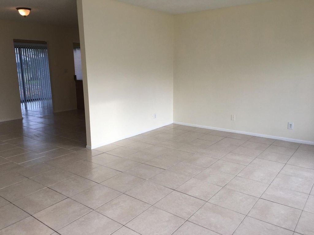 Photo of 1917 SE Burgundy Lane, Port Saint Lucie, FL 34952 (MLS # R10998694)