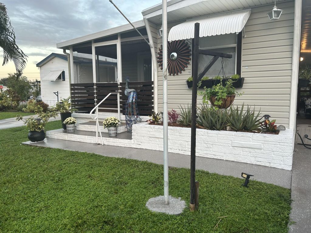 Photo of 8661 SW 18th Place, Davie, FL 33324 (MLS # B26005104)