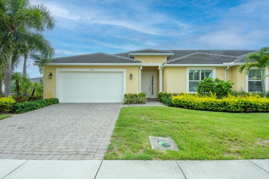 Photo of 6152 NW Argyll Lane, Port Saint Lucie, FL 34983 (MLS # R10971546)