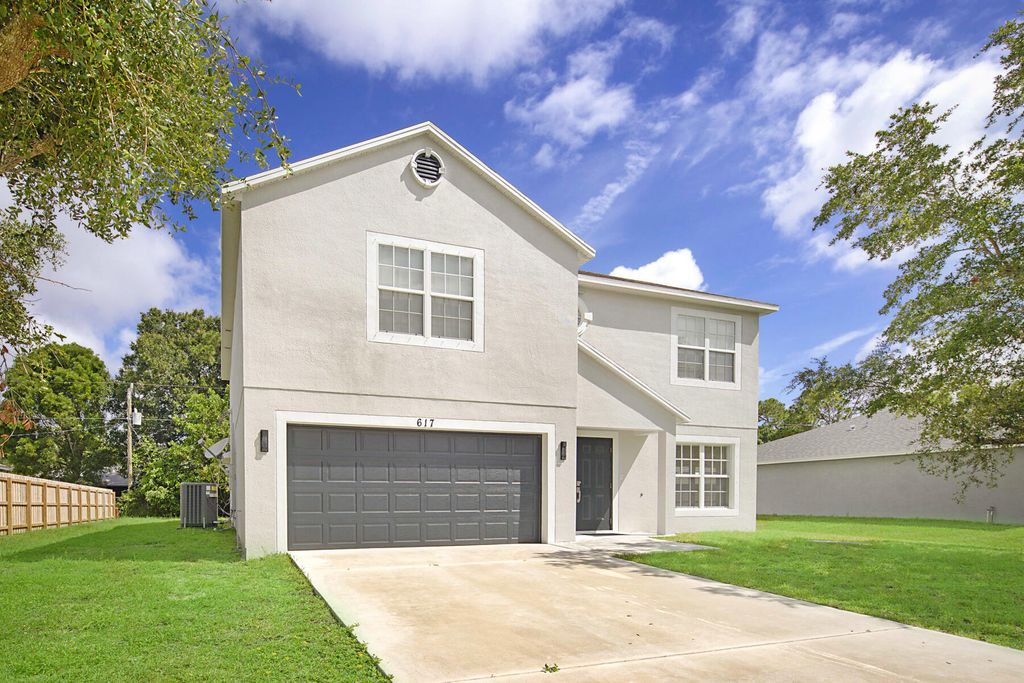 Photo of 617 SE Karrigan Terrace, Port Saint Lucie, FL 34983 (MLS # B26011057)