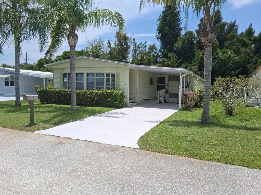 Photo of 214 W Caribbean, Port Saint Lucie, FL 34952 (MLS # B26046214)