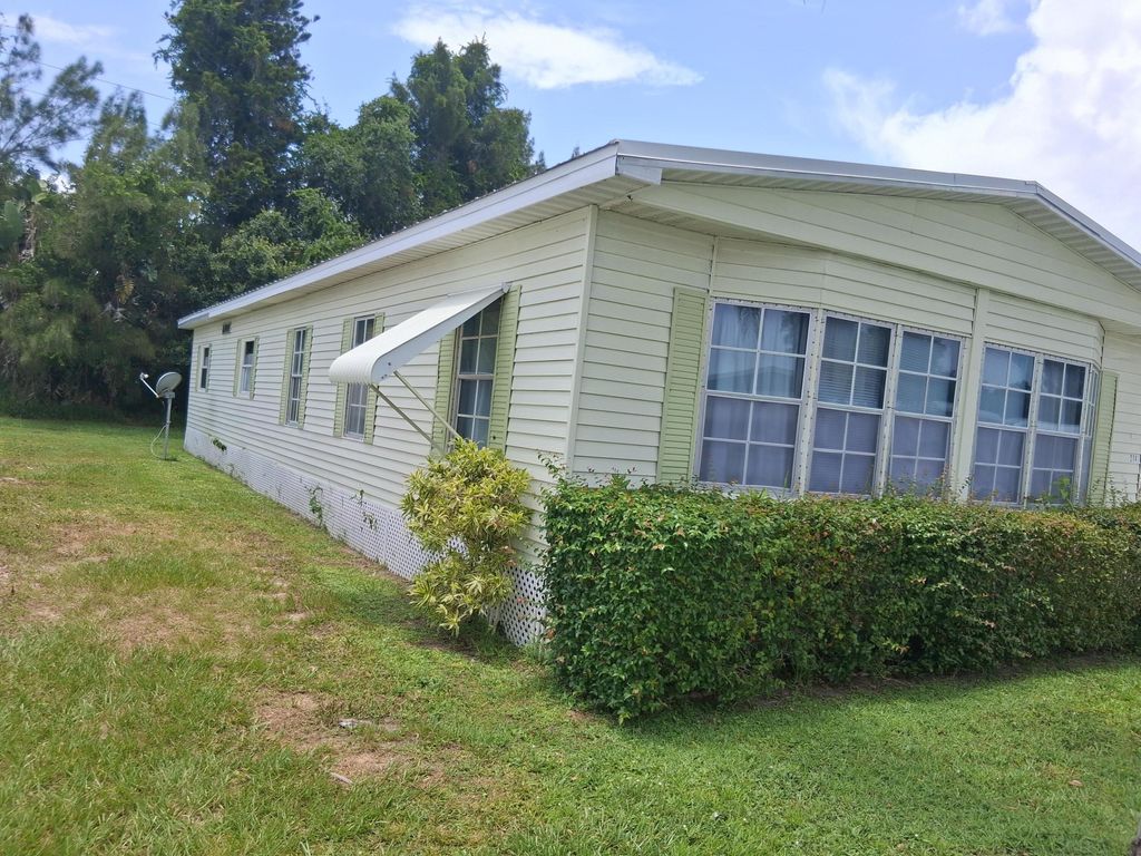 Photo of 214 W Caribbean, Port Saint Lucie, FL 34952 (MLS # B26046214)