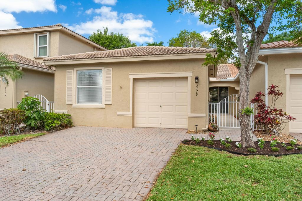 Photo of 2179 Man Of War, West Palm Beach, FL 33411 (MLS # B26020112)
