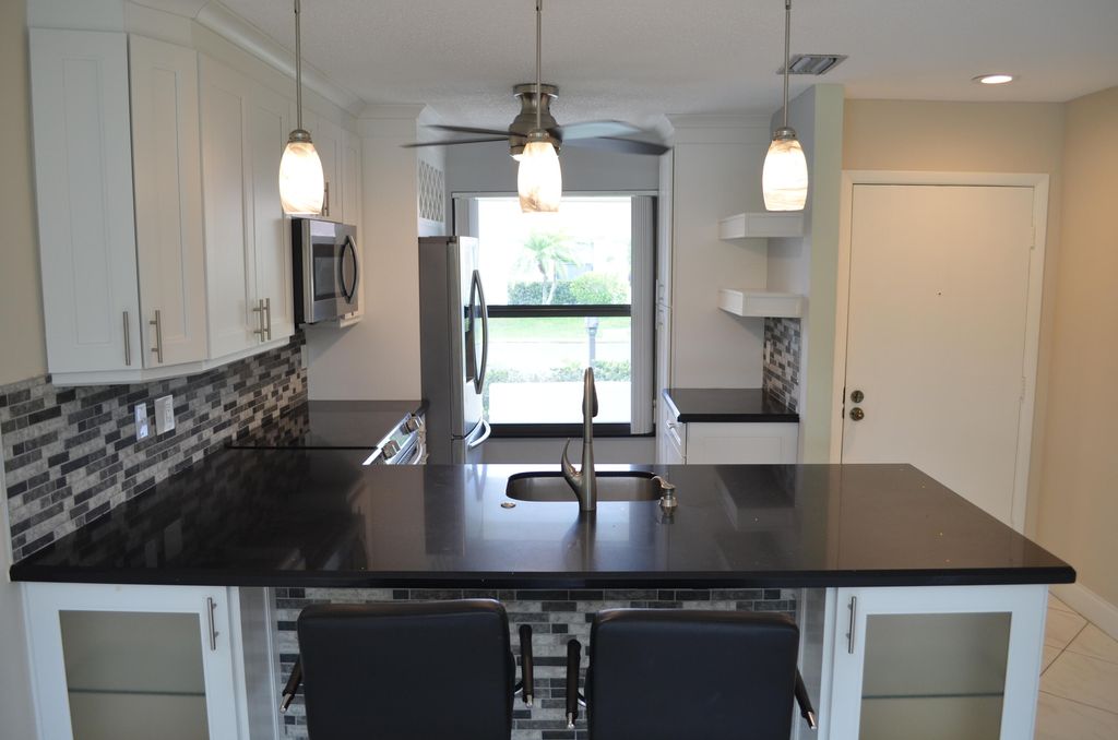 Photo of 15704 Philodendron Circle, Delray Beach, FL 33484 (MLS # R11114415)