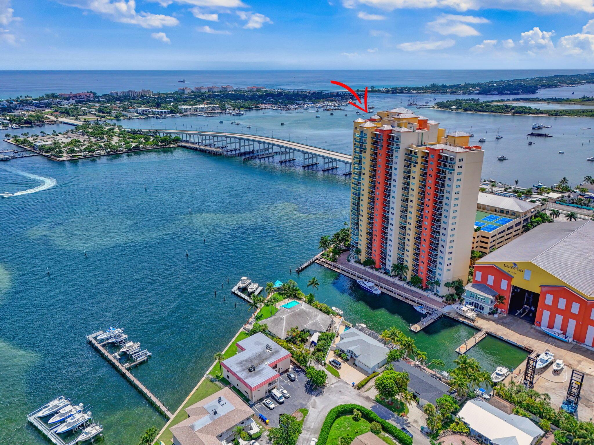 Stunning lower penthouse condo, boasting sweeping OCEAN and INTRACOASTAL views. This light-filled two-bedroom residence showcases a beautifully designed kitchen with Whirlpool & LG appliances, designer countertops, travertine floors & custom cabinetry. The expansive owner's suite features breathtaking views, dual walk-in closets, & a spa-like bath. Enjoy resort-style living in a full-amenity building offering 24-hour guard gate, valet, garage parking, pickleball, tennis, a newly renovated pool & amenity deck w/ fire pits, grills, and lounge areas. Additional perks include a club room, billiards, ping-pong, boardroom, and pet-friendly policies. Upcoming improvements include a redesigned lobby, locker rooms, and package/mail facilities. Enjoy peace of mind with 100% impact glass & 2022 AC!