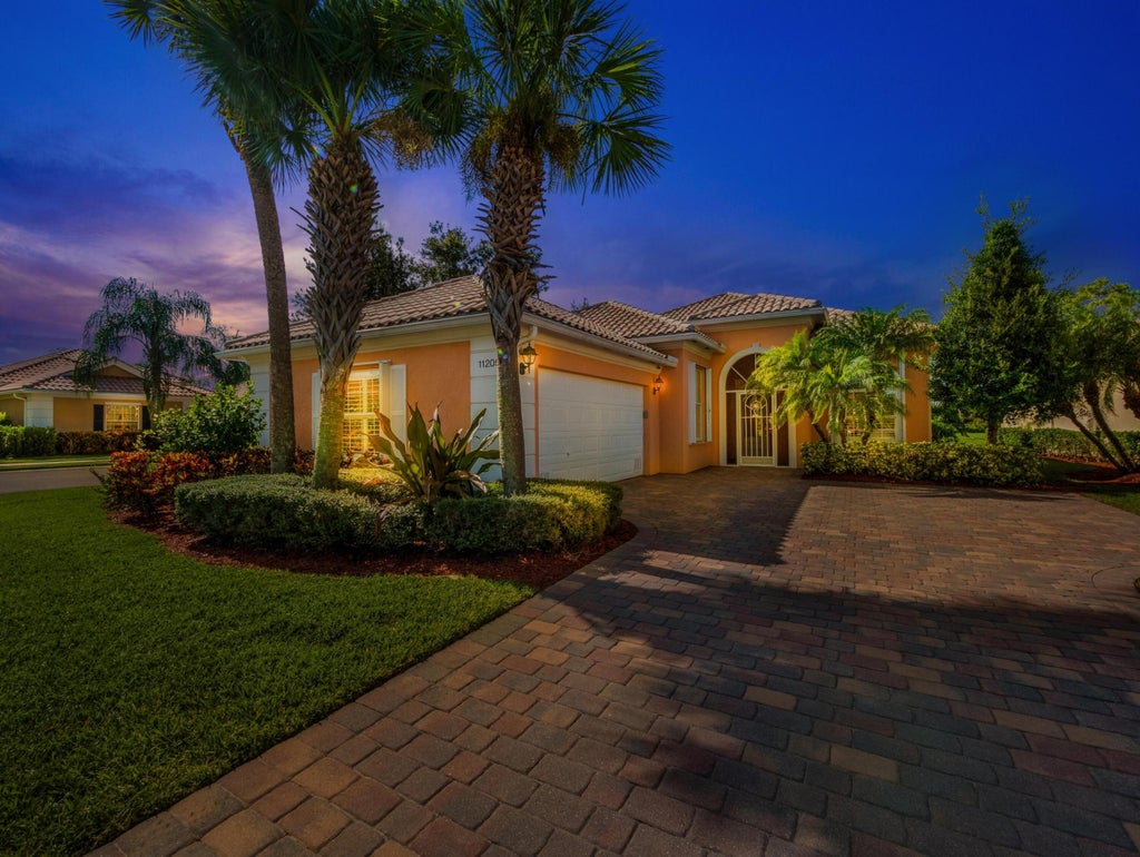 Photo of 11205 SW Northland Drive, Port Saint Lucie, FL 34987 (MLS # R10993699)