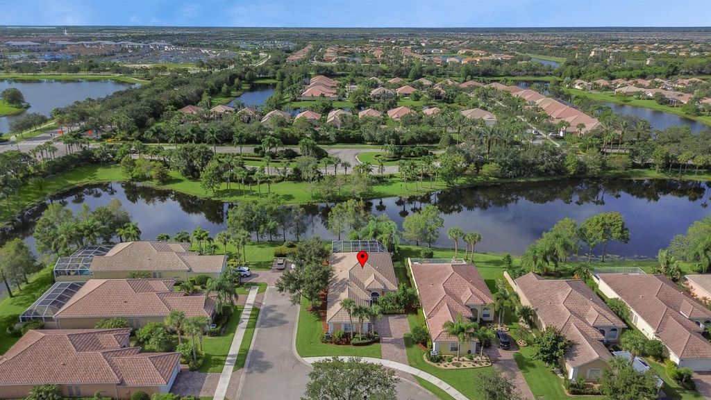 Photo of 11205 SW Northland Drive, Port Saint Lucie, FL 34987 (MLS # R10993699)