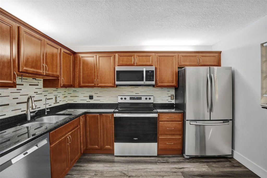 Photo of 869 NW 47th Street, Deerfield Beach, FL 33064 (MLS # F10556858)