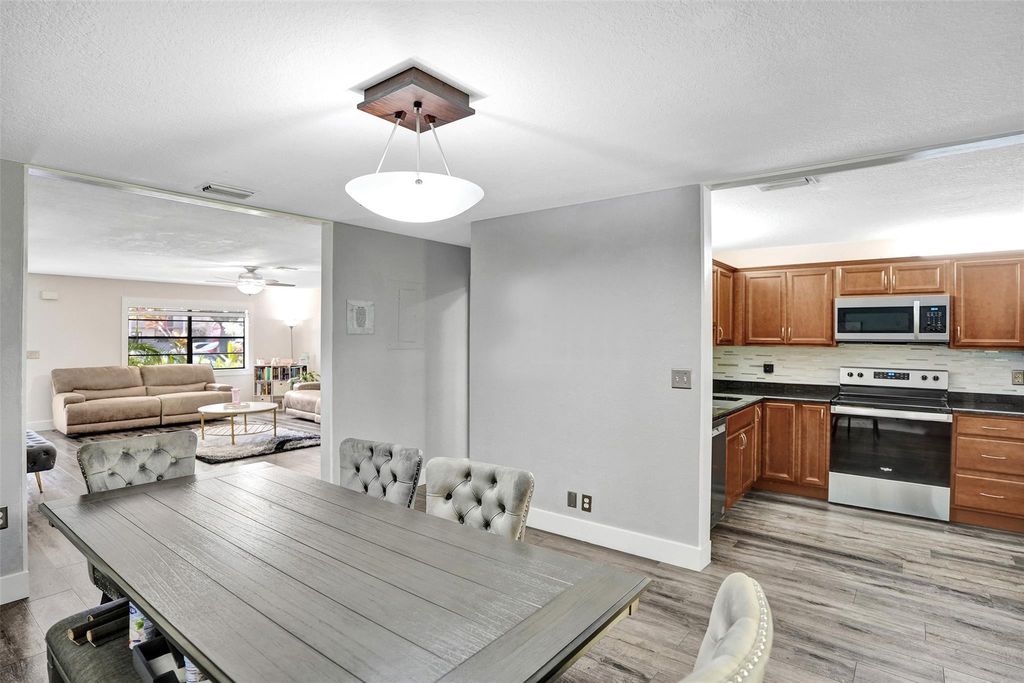 Photo of 869 NW 47th Street, Deerfield Beach, FL 33064 (MLS # F10556858)