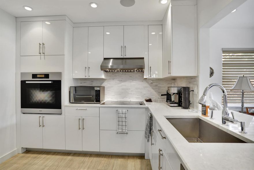 DO NOT MISS OUT!!!
Pristine and spacious 2 bd 2 ba, 2nd floor condo with an one car garage and driveway at Lighthouse Village Condo. Tastefully remodeled unit with lots of light and high ceilings. Modern white open kitchen with European cabinetry and Miele Stainless Steel Appliances. Tile porcelain floors, recessed lights throughout with custom made closets.  
Please click on 360 VIDEO TOUR to view property.
GREAT LOCATION