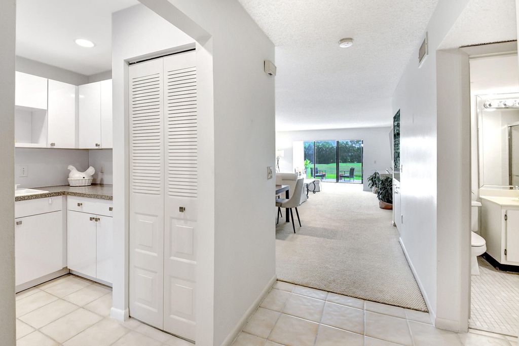 Photo of 11 Southport Lane #E, Boynton Beach, FL 33436 (MLS # R10959650)